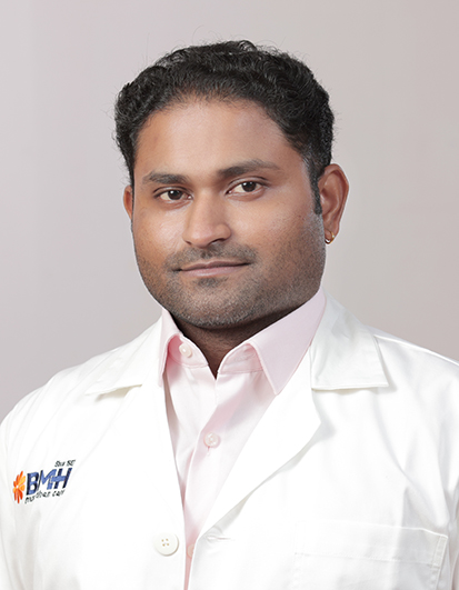Dr Vinit R