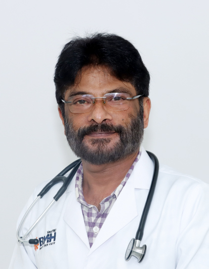 Dr Tomi Mathew
