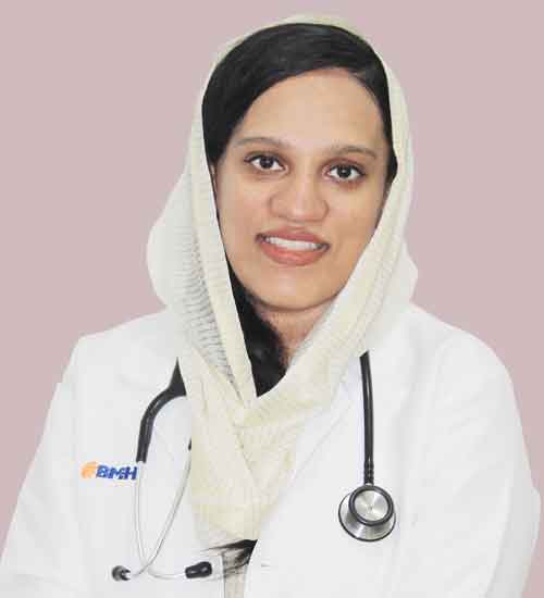 Dr Nida S